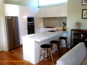 Arctic White Velvet Invisedge and Roller Door | Innovative Kitchens in Mt Roskill