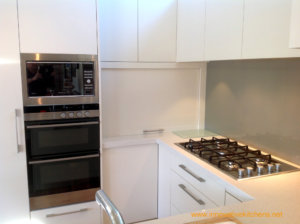 Arctic White Velvet Invisedge and Roller Door | Innovative Kitchens in Mt Roskill