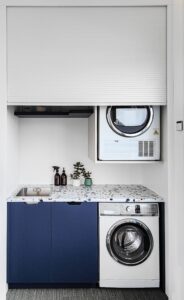 Motorized Laundry roller door - painted timber slats