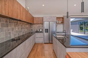 Sage-Doors-Lookcrete-Matala-Nautical-Homes-Timbalook-Taranaki-kitchen