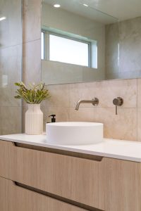 Mangawhai-Design-Sage Doors Invisedge-Seasoned-Oak-handle-cutout-bathroom-vanity