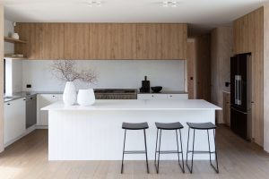 Lume Design Sage Doors Timbalook Matakana and White vgroove-panel Kitchen with island