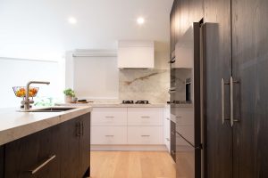 Nest Interiors & Design - Sage Doors Timbalook Rangitoto and White kitchen with island - Alt View