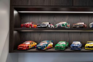 Nest Interiors & Design - Timbalook Rangitoto shelving with cars in a kids room