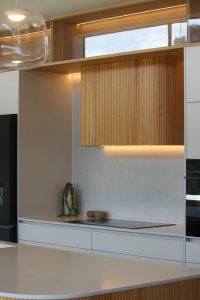 Sage-Doors-Oak-beaded-panel-cuved-kitchen-island-and-rangehood-The-Kitchen-People