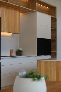 Sage-Doors-Oak-beaded-panel-cuved-kitchen-island-and-rangehood-The-Kitchen-People