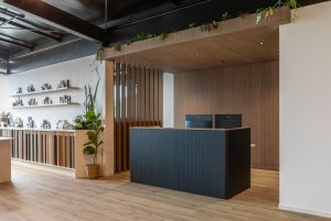 Sage Doors reception desk Opticoat Chicago flexipanel Panther Woodgrain with Timbalook Ohakune battens and wall and ceiling panels